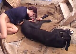 Hot redhead gives extended blowjob on a big dog dick