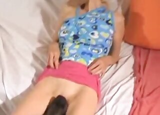 Sex tape scene showing skinny blonde that fucks her brown dog